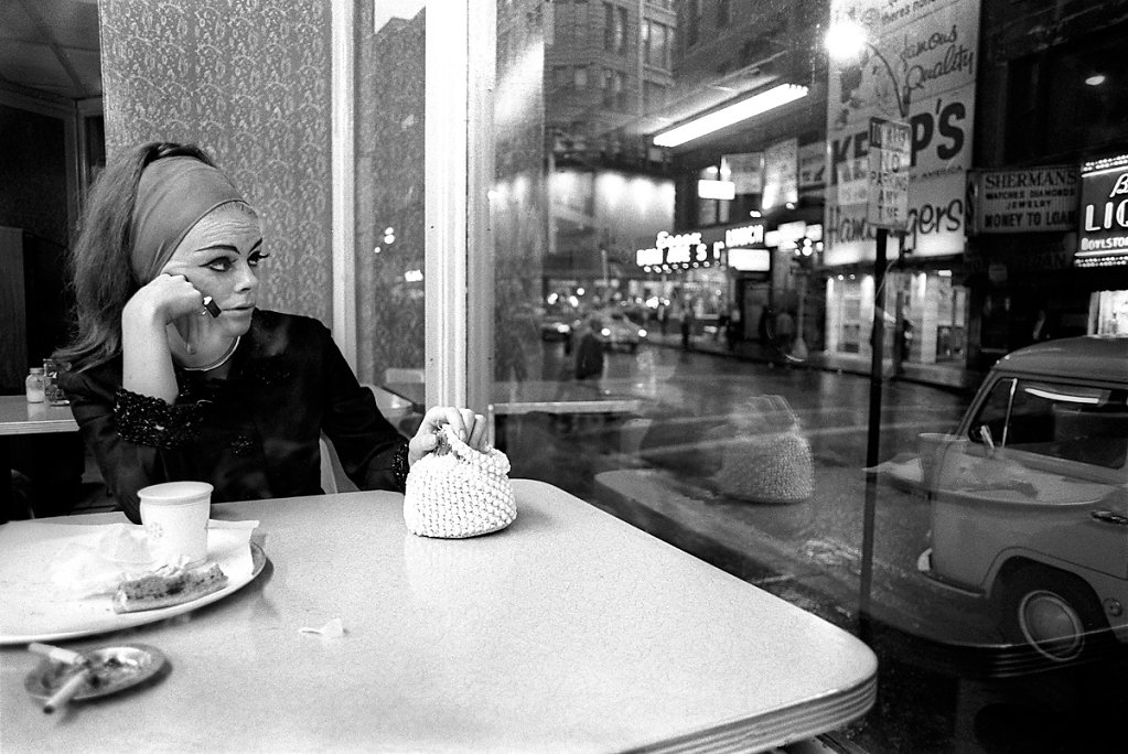 Jerry Berndt, Prostitute looking out window, Washington Street, Boston, 1968