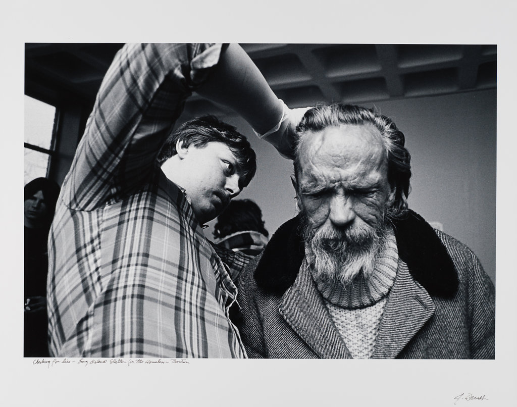 Checking for lice, Long Island Shelter, Boston, 1983