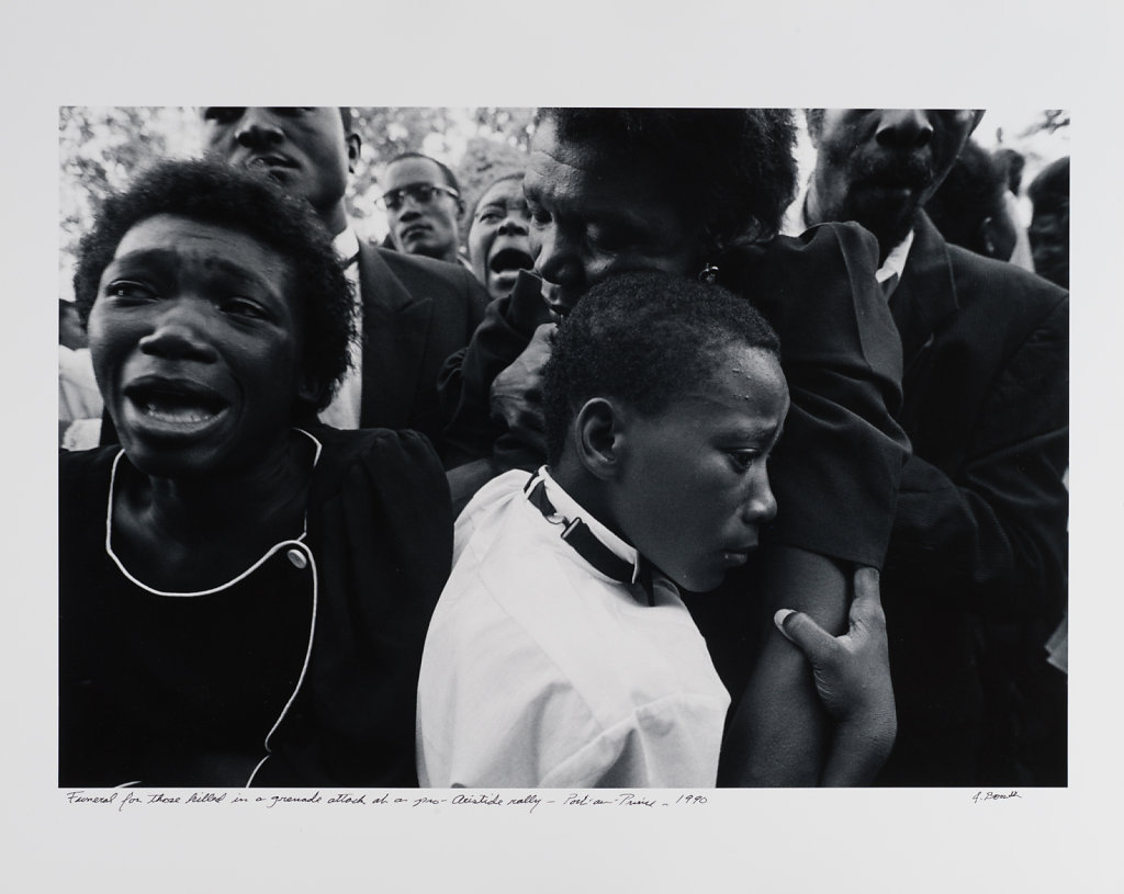 Funeral for those killed in a grenade attack at a pro-Aristide rally, Port-au-Prince, Haiti, 1989